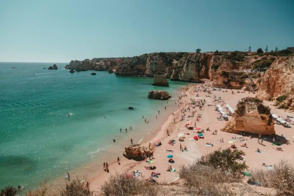 relaxing on sunny beach scaled 1 1400x933 1