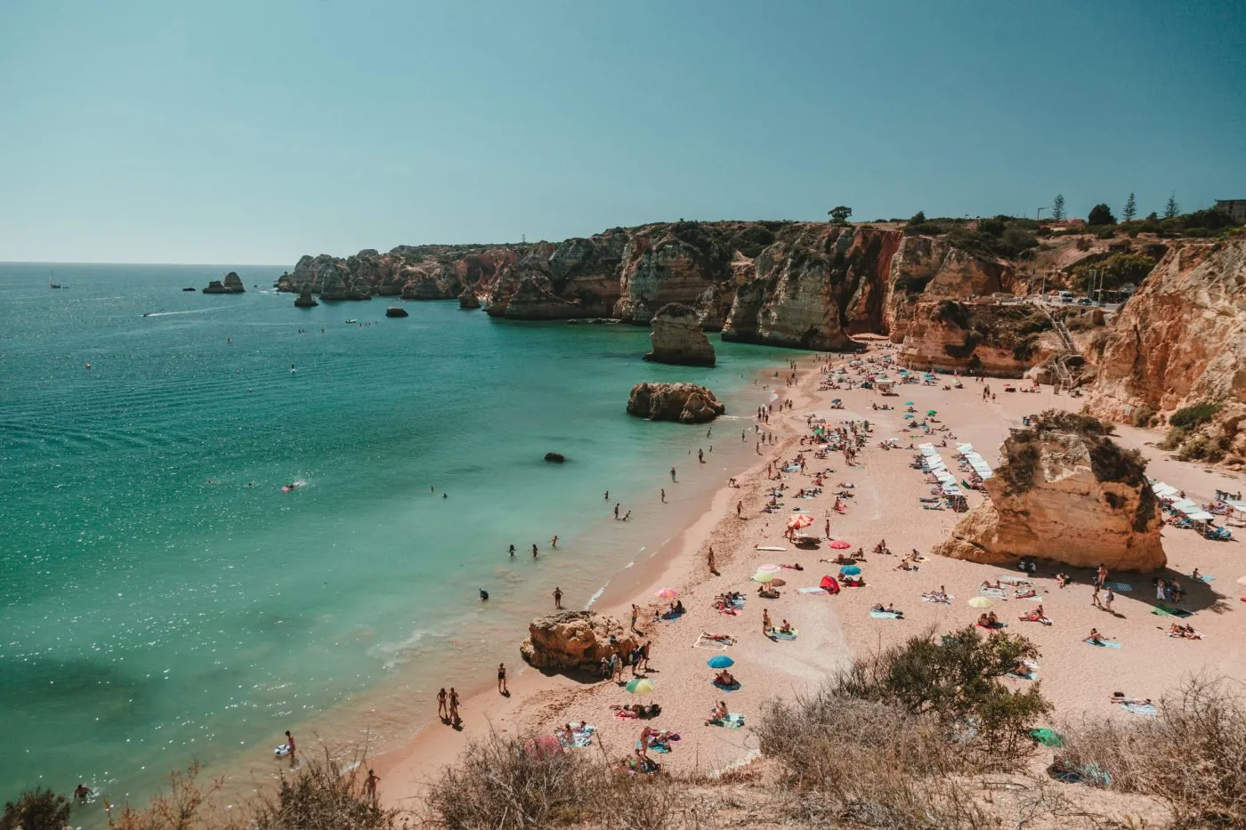 relaxing on sunny beach scaled 1 1400x933 1